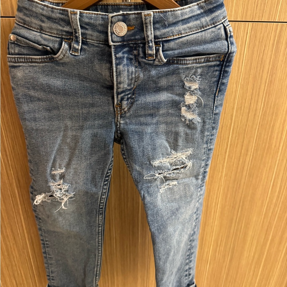 Blue ripped winter jeans